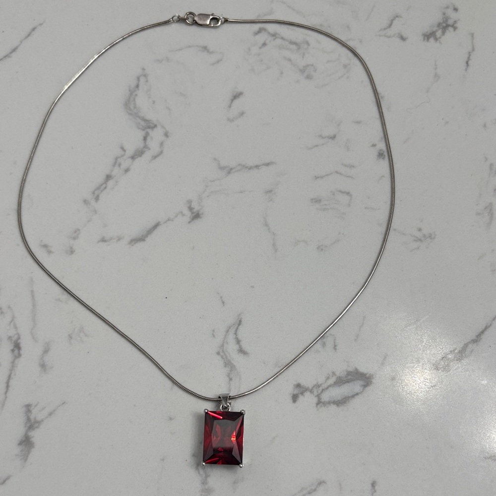 Elegant Silver Necklace with Red Pendant